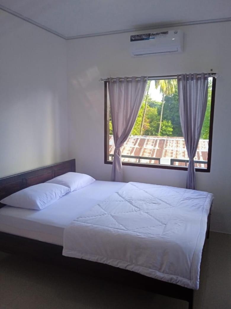Riung Tiga Empat Tujuh Guesthouse Экстерьер фото